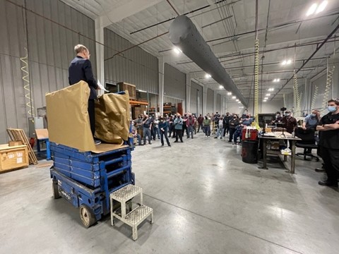 Gordy Meicher explains new ESOP program to company employees of a local manufacturer.