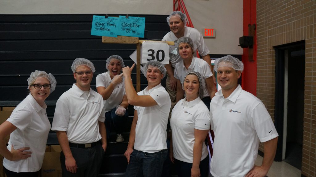 Meicher CPAs team volunteering at Sauk Prairie Against Hunger.